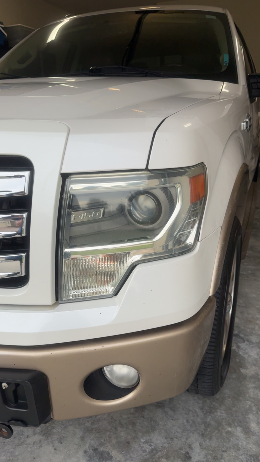 Ford F-150 headlight restored to a clear finish after Crystal Clear headlight restoration in Citrus County FL